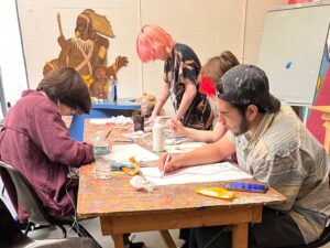 Teens create art in the AMA classroom