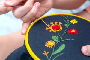 Women's hand embroidery in a hoop